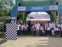 Ribuan Warga Ikut Jalan Sehat Estafet Obor BUMN
